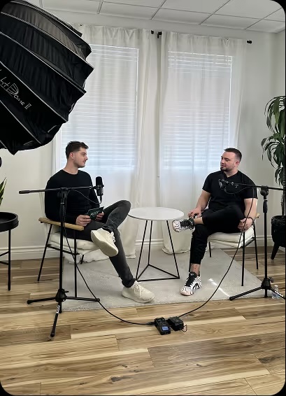 Podcast-style brand interview setup with light dome and microphones