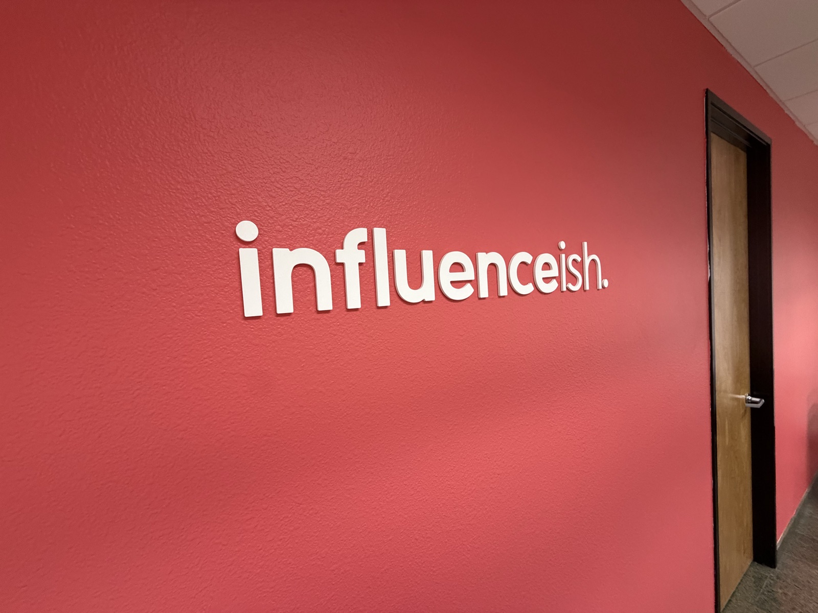 The Influenceish office — brand wall in North County San Diego
